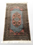 A Lahore Bokhara rug, Pakistan, 146cm x 82cm.