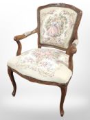 A continental salon armchair in tapestry fabric.