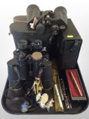 A pair of Durham 10x50 binoculars, further pair of Mark Scheffel 10x30 binoculars, a further pair,
