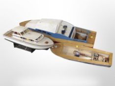 Two scale model boats, and a further hull, largest 115cm.