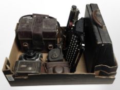 A vintage Corona typewriter, together with several vintage cameras including Pentax, Ilford.