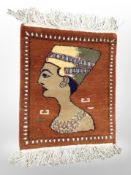 A North African rug depicting a pharaoh,