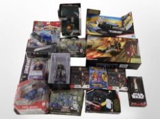 14 various Hasbro and other figurines including Star Wars, Ben 10, DC, etc., boxed.