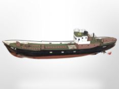 A scale model remote control boat marked 'Wotan Emden', on stand, length 83cm.