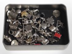 Approximately 40 white metal charms, many stamped 925.