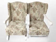A pair of painted framed wing back armchairs,