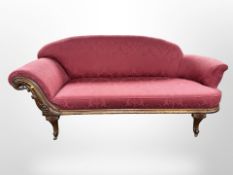 A Victorian carved walnut chaise longue,