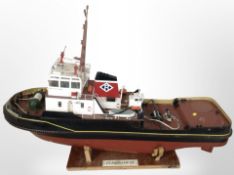 A scale model remote control boat marked 'Eldergarth', on stand, length 103cm.