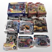 10 Hasbro Transformers figurines, boxed.