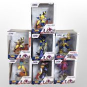 Nine Zoteki superhero figurines, boxed.