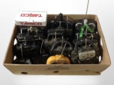 A collection of remote control handsets.