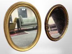 Two antique-style oval mirrors, each approximately 51cm x 64cm.
