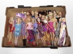 A collection of Barbie dolls.