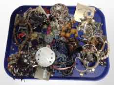 A collection of modern costume jewellery, bead necklaces, bangles, etc.