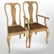 A 20th century Danish blond oak armchair and a similar single chair