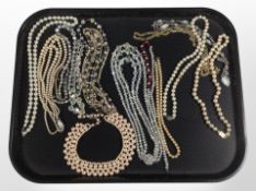 A group of jewellery including a Monet faux pearl knotted necklace,