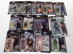 12 Kenner Disney Star Wars figurines including Rogue One, The Mandalorian, etc., boxed.