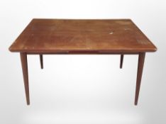 A 20th century Danish teak extending dining table,