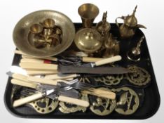 A group of Indian engraved brass wares including pedestal bowl, together with several horse brasses,