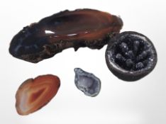 Four geode specimens including polished agate slice, etc., largest 13cm long.
