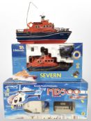 A model radio control lifeboat, in box, a further unboxed example,
