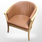 A Danish Hurup beech-framed and stitched tan leather armchair, width 69cm.