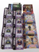 13 Mattel and Funko figurines including DC Universe, Justice League, Megaman, etc., boxed.