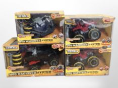 Four Tonka Mod Machines vehicles, in boxes.