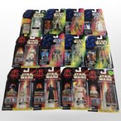 12 Kenner and Hasbro Star Wars figurines, boxed.