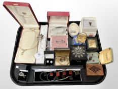 A group of costume jewellery, necklaces, cat brooch,