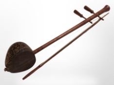 An Eastern stringed instrument with bow.