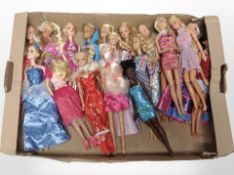 A collection of Barbie dolls.