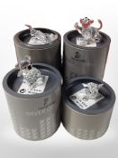 Four boxed Swarovski crystal figures including crocodile, lion, koala bear, and elephant.