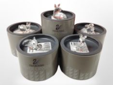 Five boxed Swarovski crystal figures including mice, rabbits, etc.