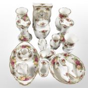 18 pieces of Royal Albert Old Country Roses cabinet china including quartz mantel timepiece, vases,
