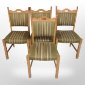 Five Danish oak framed dining chairs in striped upholstery
