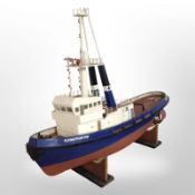 A scale model remote control boat marked 'Flying Phantom Greenock', on stand, length 118cm.