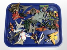 A group of die-cast model aircraft and other figures including Matchbox.