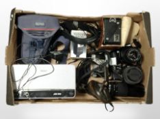 A group of cameras including Canon EOS 3000, Yashika FX-D, etc.