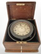 A Sestrel ship's compass in oak case.