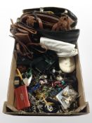 A group of lady's leather handbags, costume jewellery, bead necklaces, bangles, etc.
