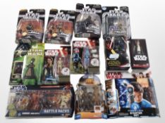 12 various Hasbro Star Wars figurines, boxed.