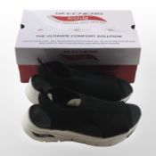 A pair of lady's Skechers shoes, size 4.