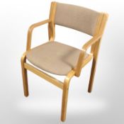 A Danish laminated bentwood office chair in oatmeal fabric.