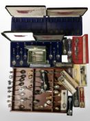 Several cases of collector's spoons, a further mahogany wall rack containing spoons, etc.