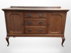 An Edwardian mahogany sideboard,