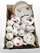 A quantity of Royal Standard Red Velvet tea and dinner china.