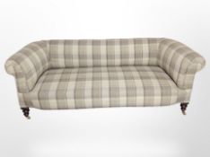 A Victorian style Chesterfield settee in beige tartan upholstery,