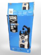 A MacAllister pressure washer in box.