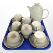 14 pieces of Denby olive-glazed pottery tea wares.